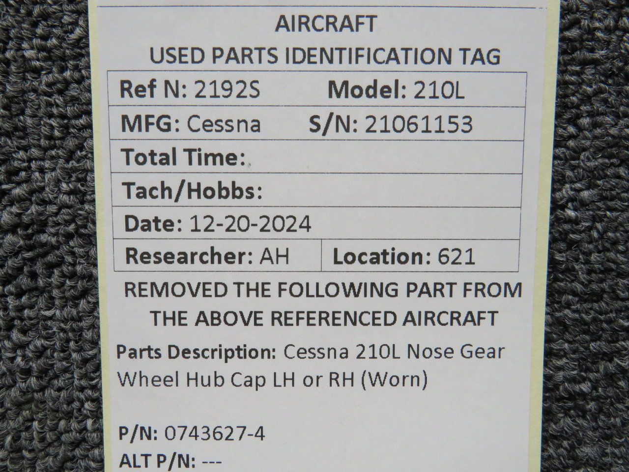 0743627-4 Cessna 210L Nose Gear Wheel Hub Cap LH or RH (Worn) (Bent)
