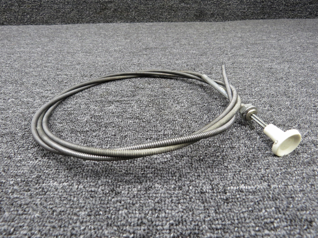 0713302-7 (Use: S1239-4) Cessna 210 Fuel Strainer Drain Control