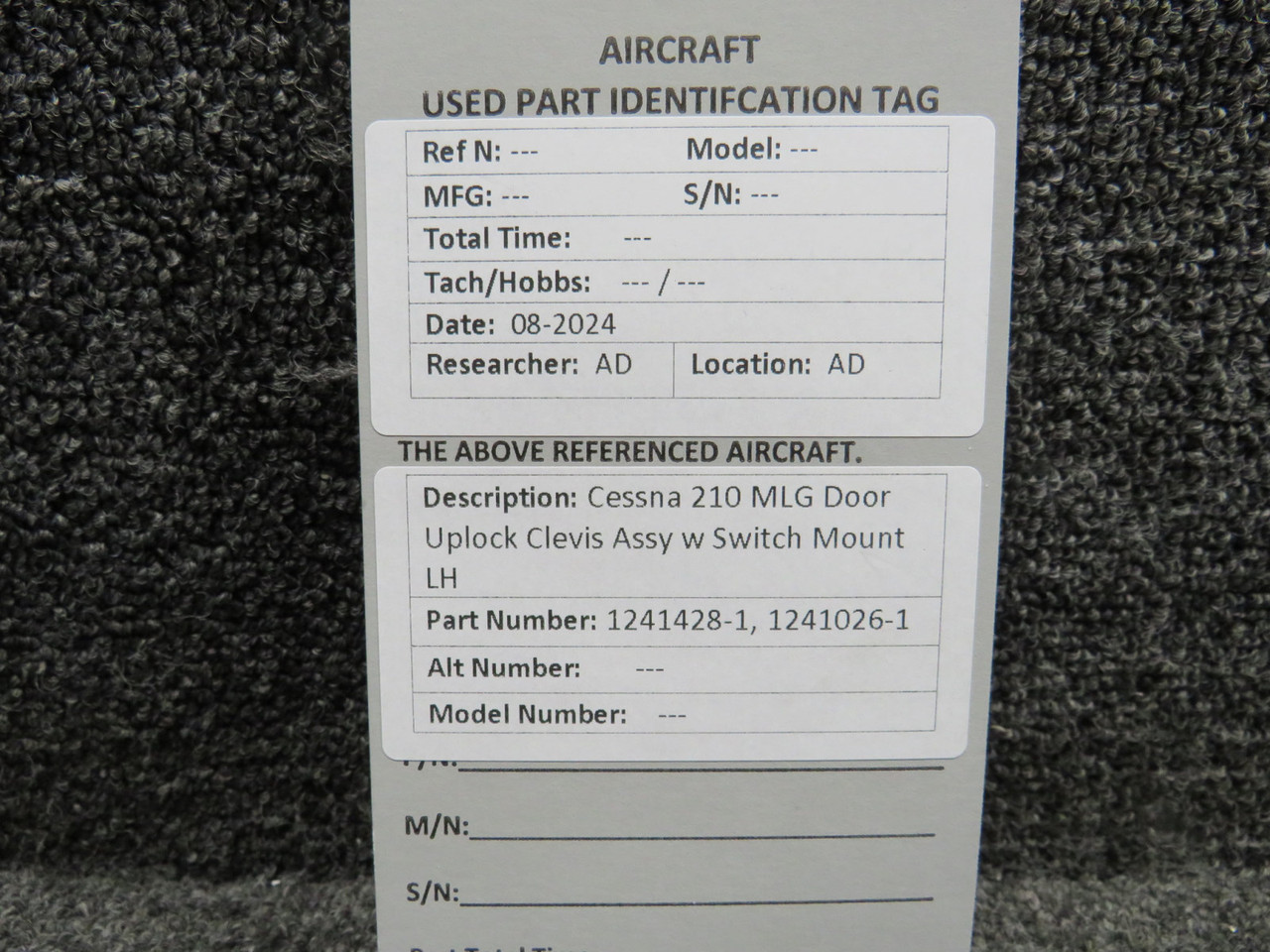 1241428-1, 1241026-1 Cessna 210 MLG Door Uplock Clevis Assy with