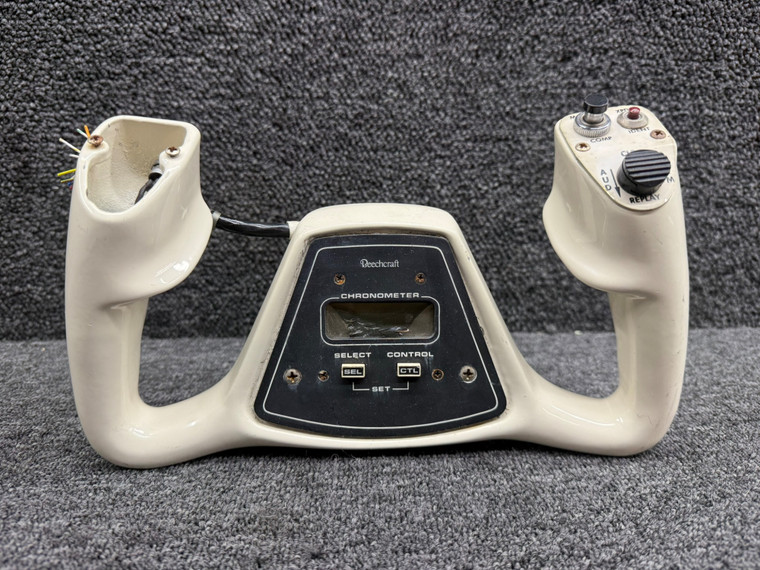 60-524080-21 Beechcraft 58 Pilot Control Wheel with Chronometer and Switches