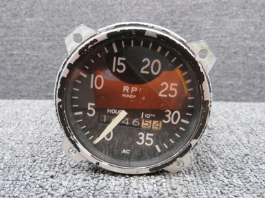 1646.54 Hour AC Tachometer Indicator Has Worn Outer Face