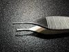 Jaw photo of Aesculap MG275R Adson Tissue Forceps, 1 X 2, Serrated, 4.75"
