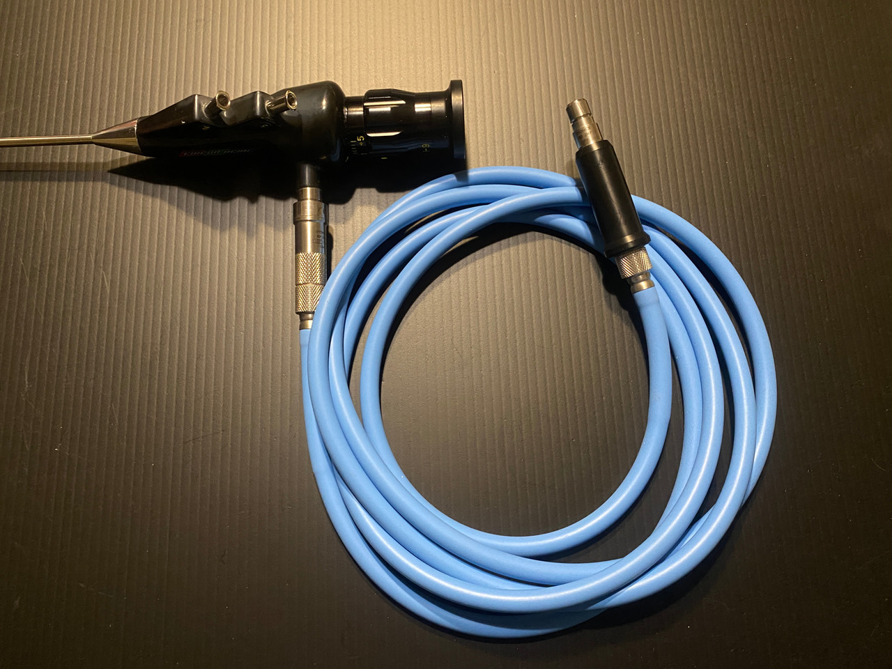 Connected photo of ACMI MR-9 Semi Rigid Ureteroscope, Dual Channel with Light Cable