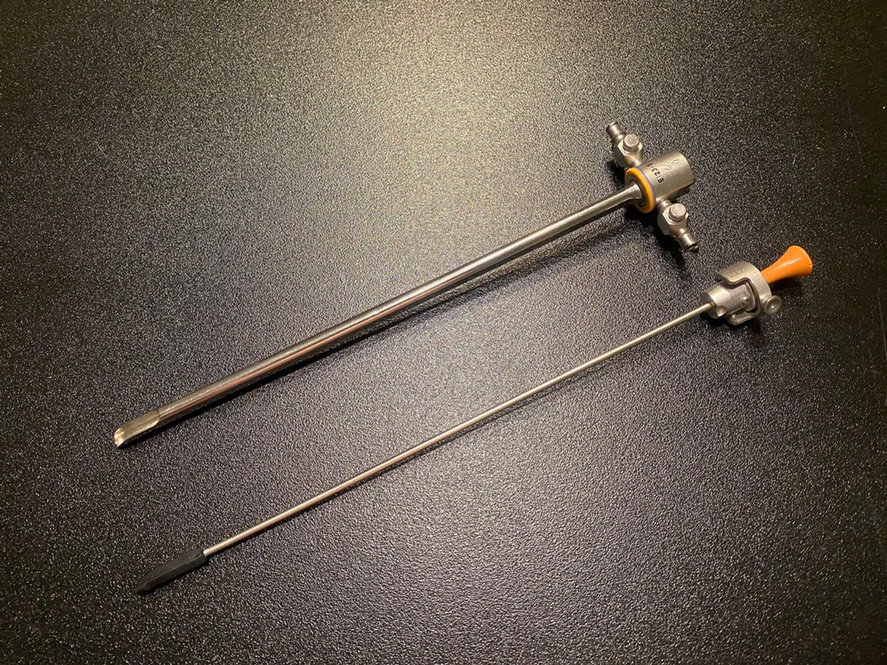 Two piece photo of ACMI E123-S Cysto Sheath and Obturator, 23FR