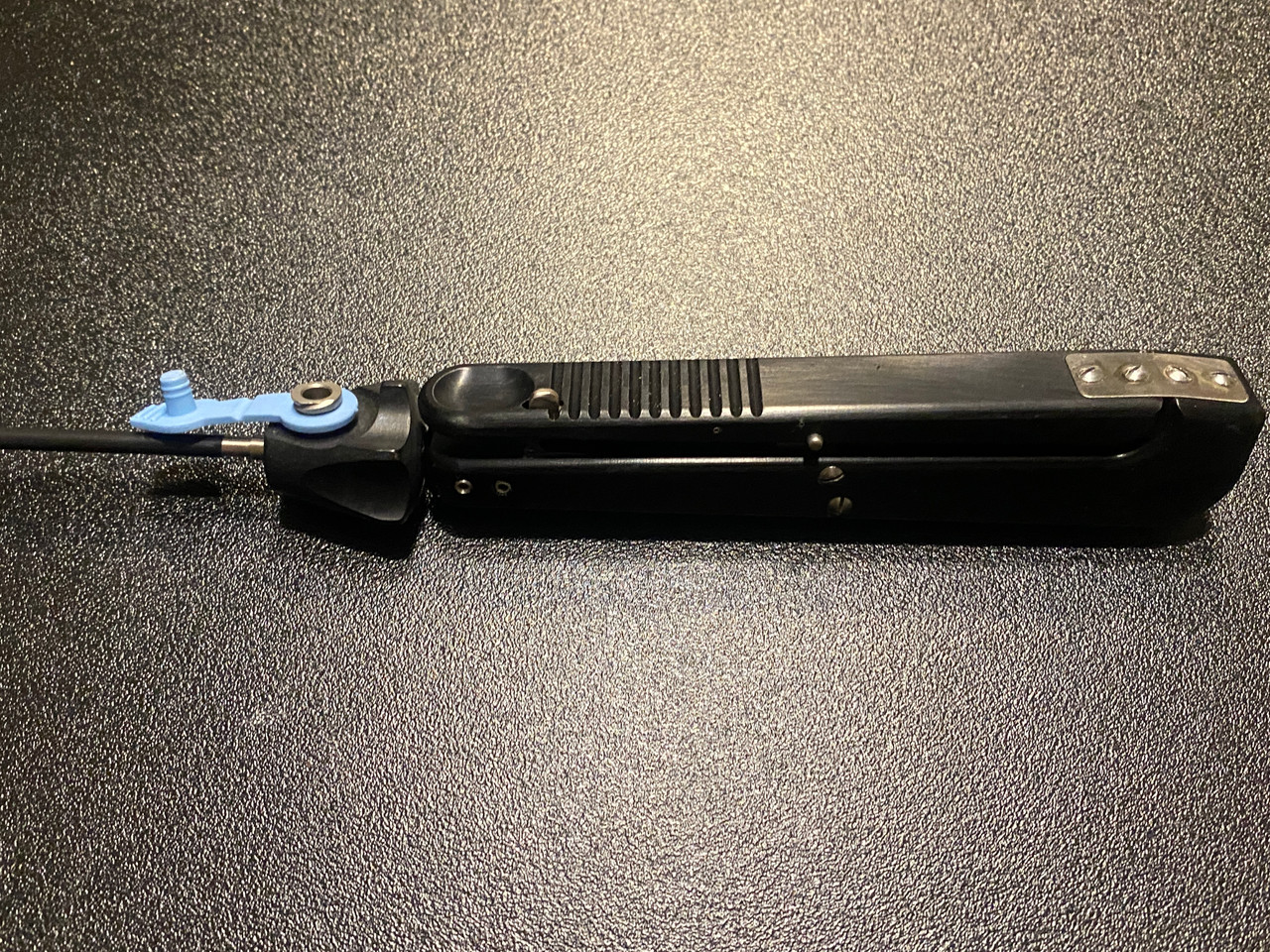 Handle photo of Snowden-Pencer 89-2001 Laparoscopic MICS Fennestrated Grasper, 3.5mm X 20cm (NEW)