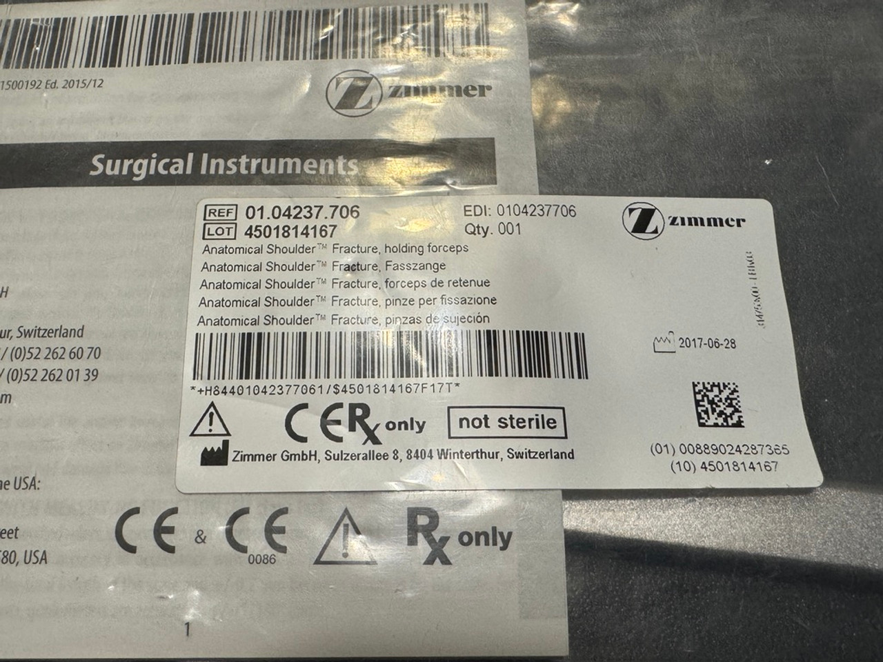 Label photo of Zimmer 01.04237.706 Anatomical Shoulder Fracture Holding Forceps (New)