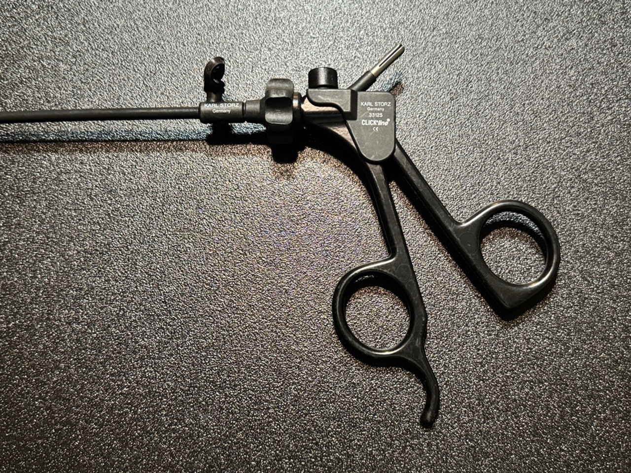 Handle photo of Storz 33425LFD Clickline Laparoscopic Atraumatic Grasping Forceps, DA, 5mm X 43cm Handle photo of Storz 33425LFD Clickline Laparoscopic Atraumatic Grasping Forceps, DA, 5mm X 43cm