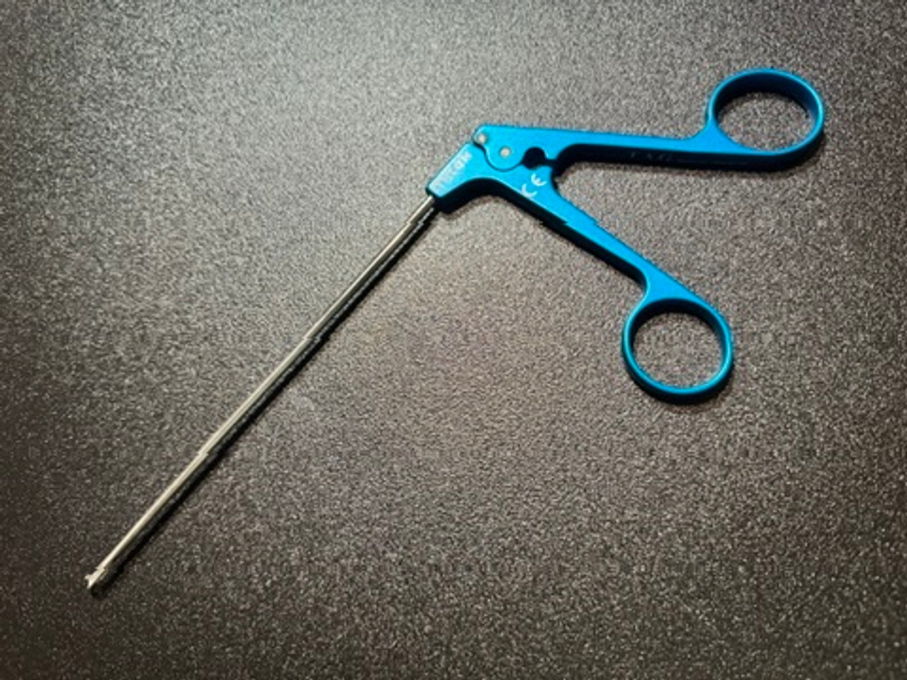 Photo of Depuy Mitek 214603 TAG Penetrating Suture Grasper, 45° Right