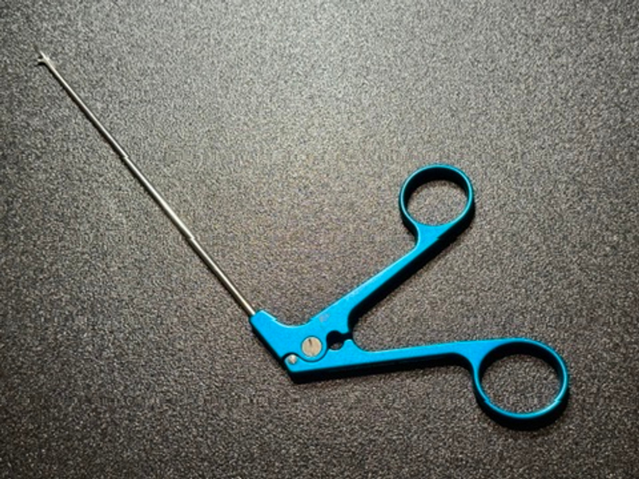 Handle photo of Depuy Mitek 214603 TAG Penetrating Suture Grasper, 45° Right