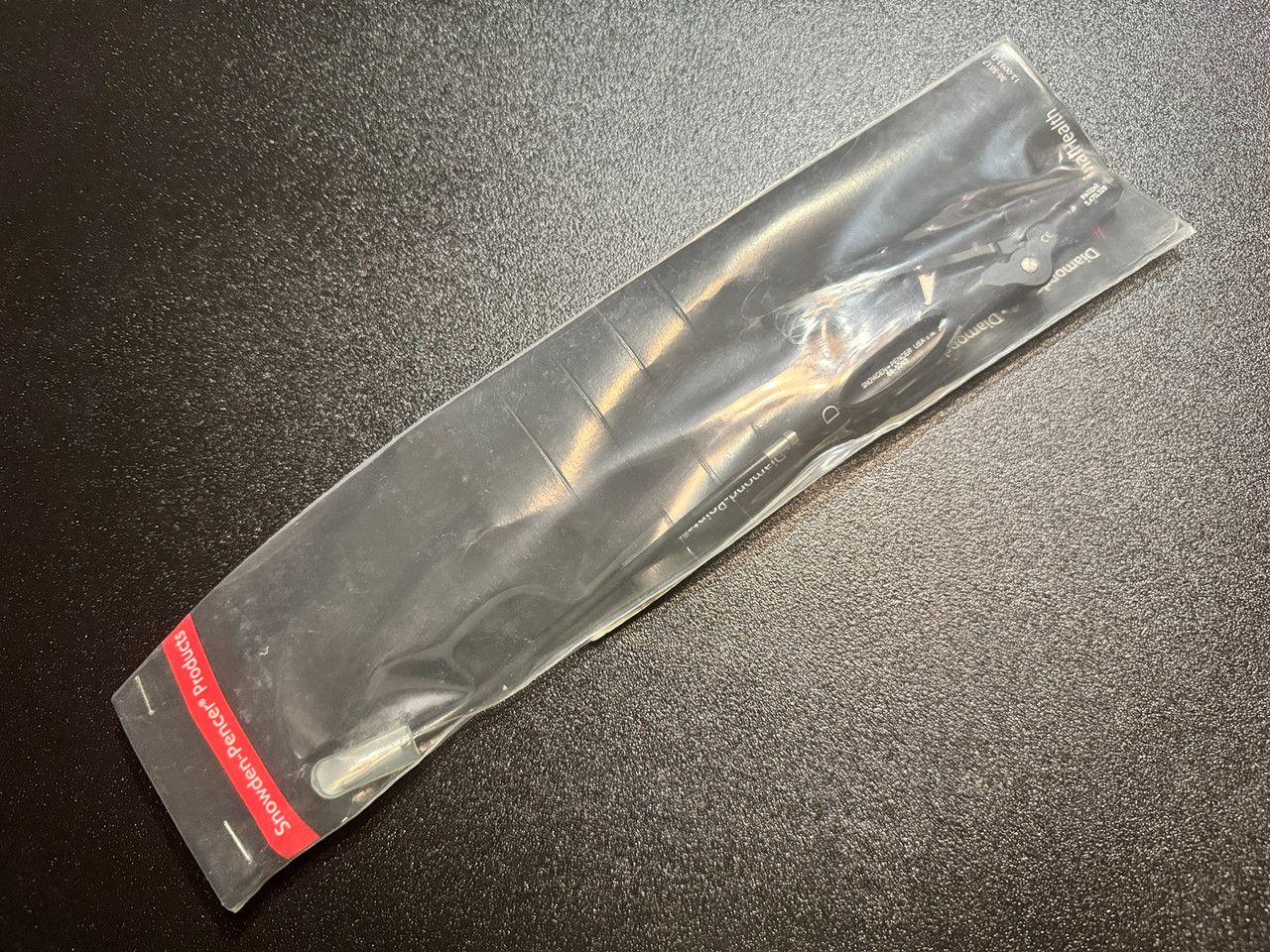 Package photo of Snowden-Pencer 88-5093 Ramirez EndoForehead Grasping Forceps, CVD Left, D (New)