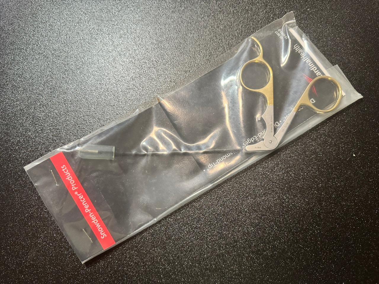 Package photo of Snowden-Pencer 88-5016 Daniel EndoForehead Grasping Forceps, CVD Right (New)