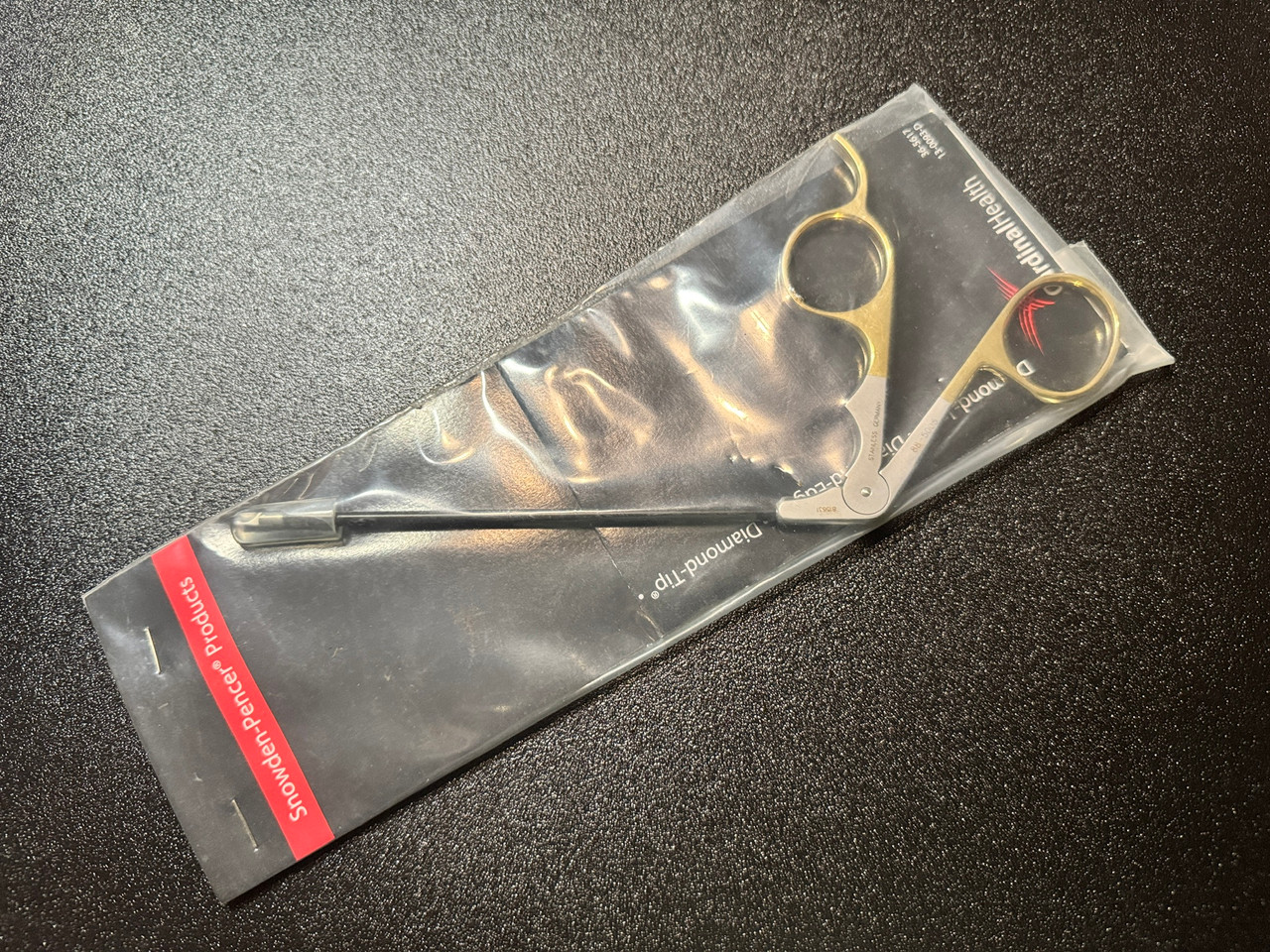 Package photo of Snowden-Pencer 88-5005 Daniel EndoForehead Hook Scissors, STR (New)