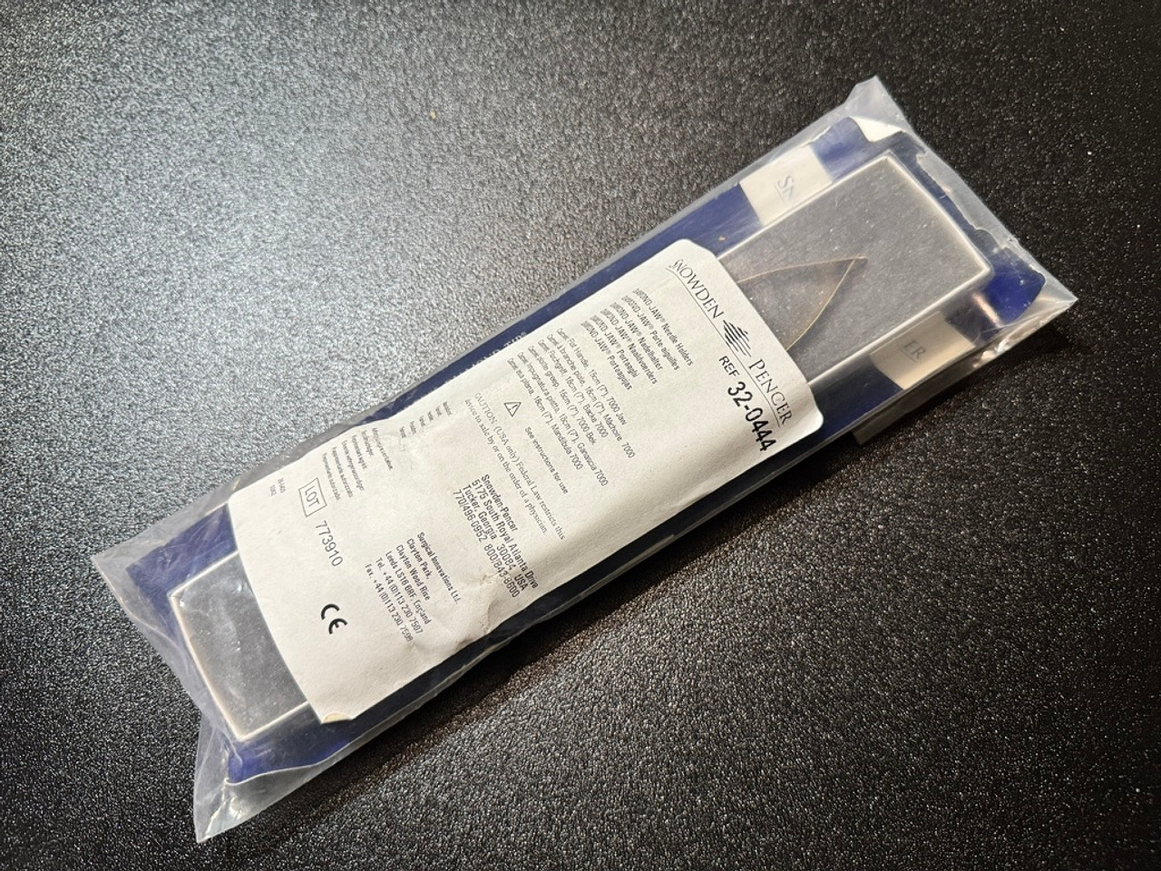 Package photo of Snowden-Pencer 32-0444 Diamond-Jaw Castroviejo Needle Holder, 7" (New)