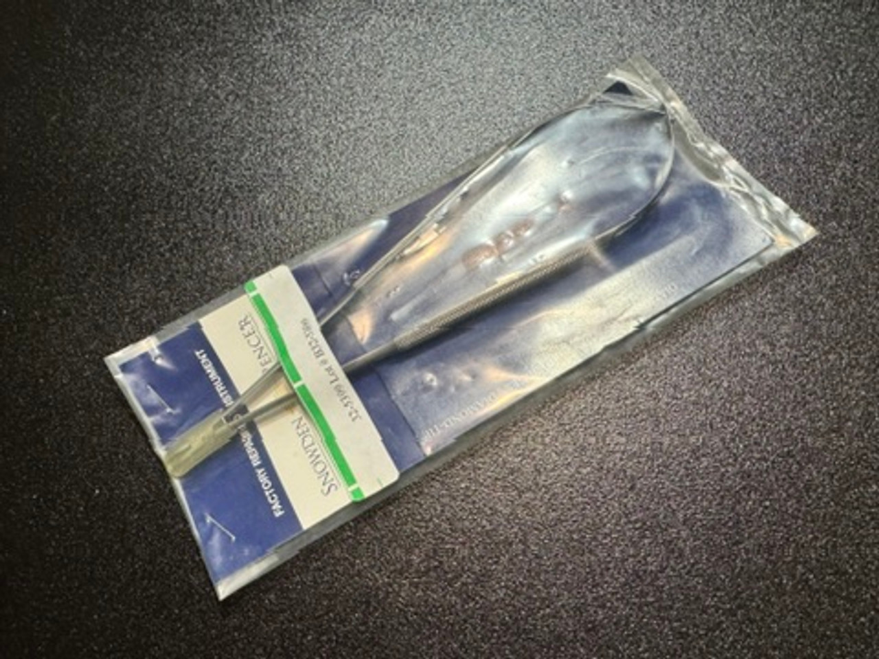 Package photo of Snowden-Pencer 32-5399 Mills Diamond-Jaw Needle Holder, 9"