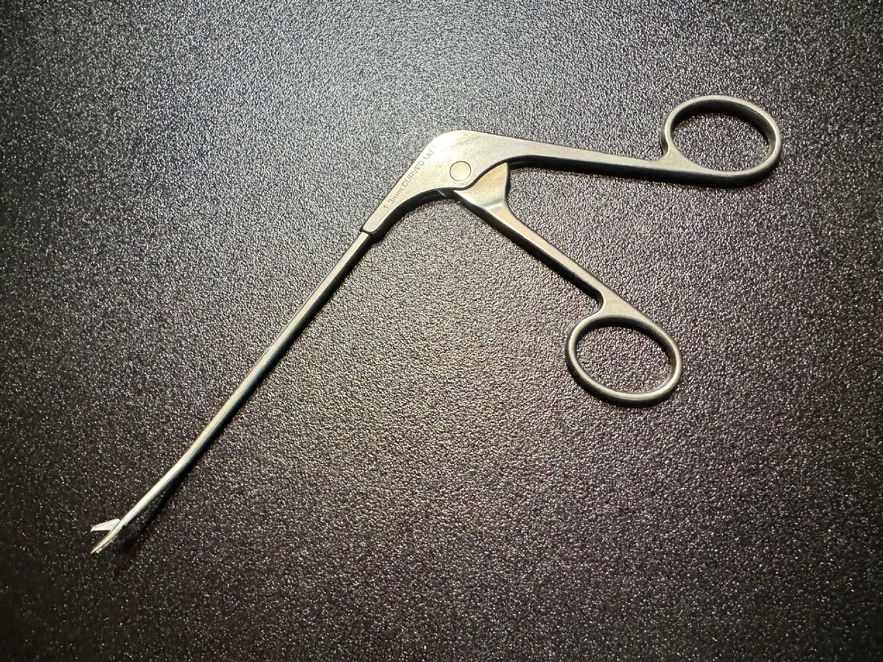 Photo of Acufex 012040 Arthroscopic Basket Punch, 1.3mm, CVD Left Photo of Acufex 012040 Arthroscopic Basket Punch, 1.3mm, CVD Left