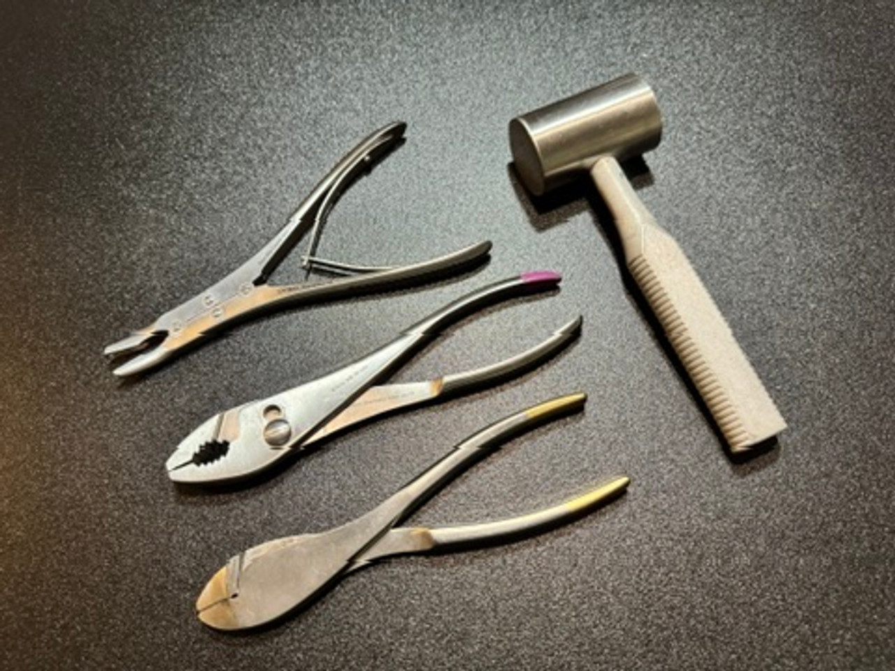 Cutter and mallet photo of Symmetry Orthopedic Large Bone Instrument Set
