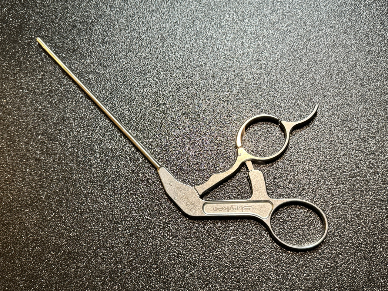 Bottom photo of Stryker Conquest 300-034-702 Arthroscopic Soft Tissue Grasper w/ Ratchet, 3.4mm