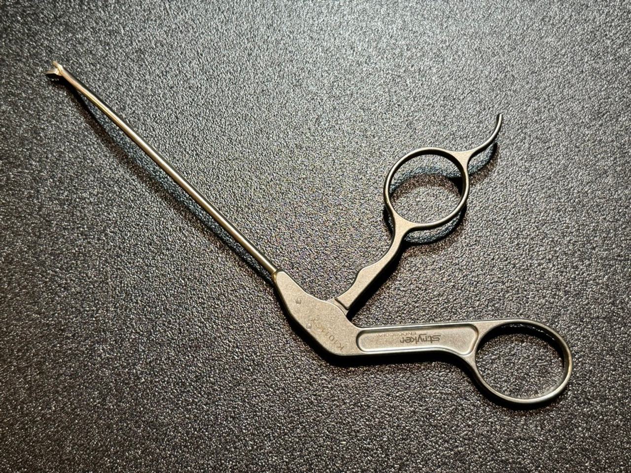 Handle photo of Stryker Conquest 300-034-102 Arthroscopic Big Bite Bunch, 30° Left, 3.4mm