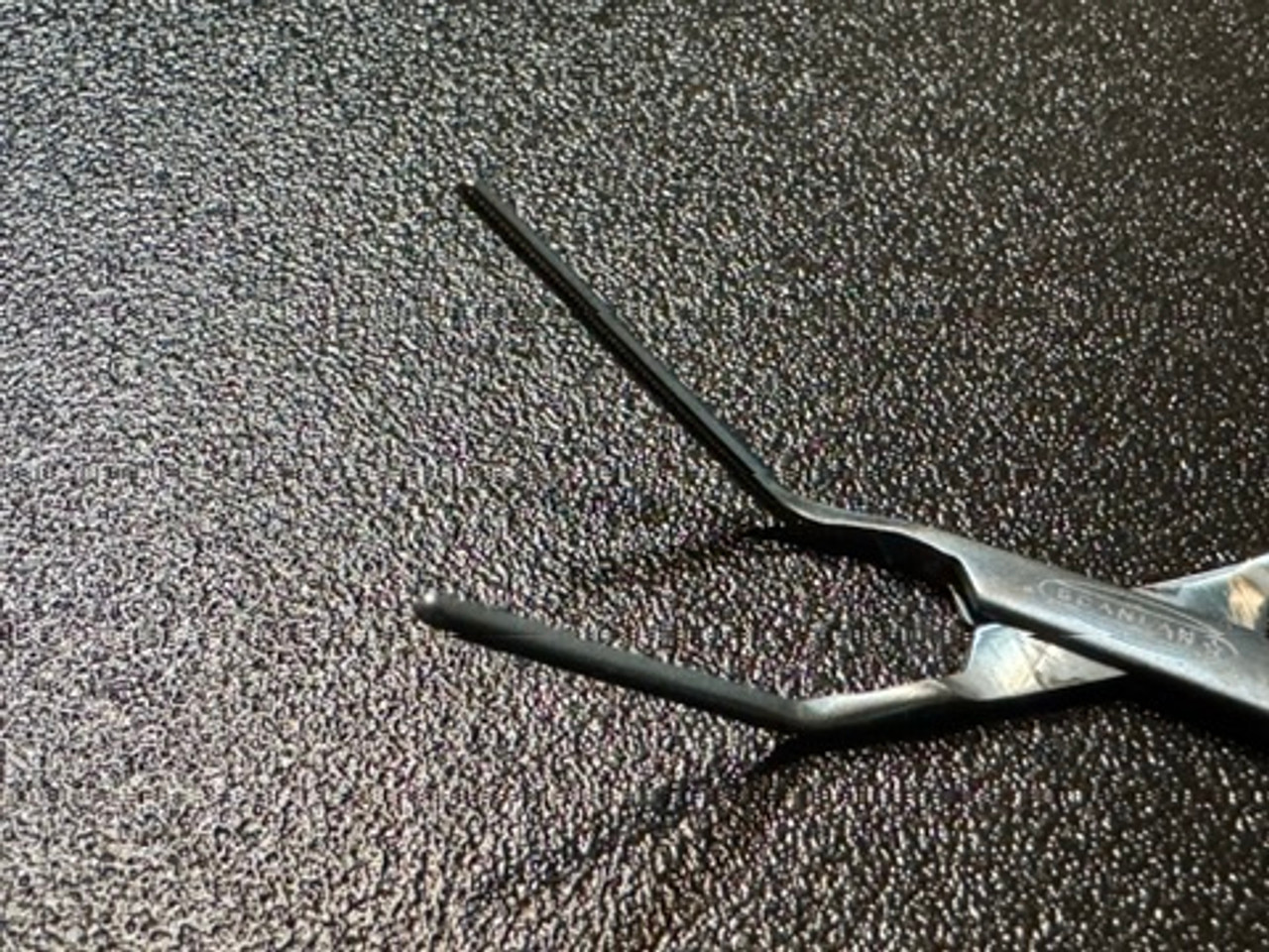 Jaw photo of Scanlan 3003-613 Titanium Micro Vascular DeBakey Clamp, 45°, 4.25"