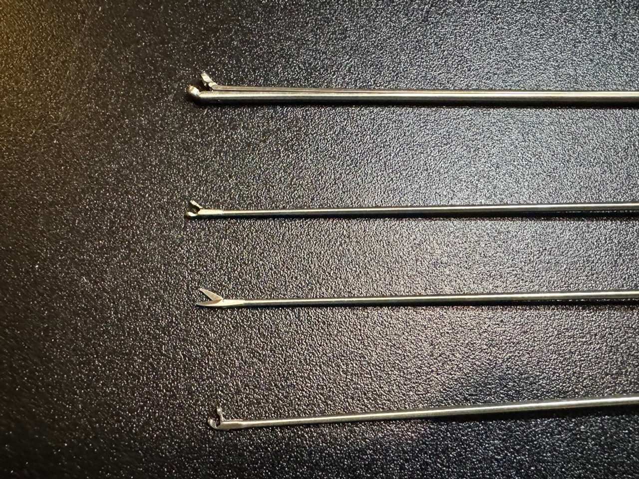 Blade and cup photo of Medtronic 3717023 Anterior Commissure Laryngoscope & Instrument Set