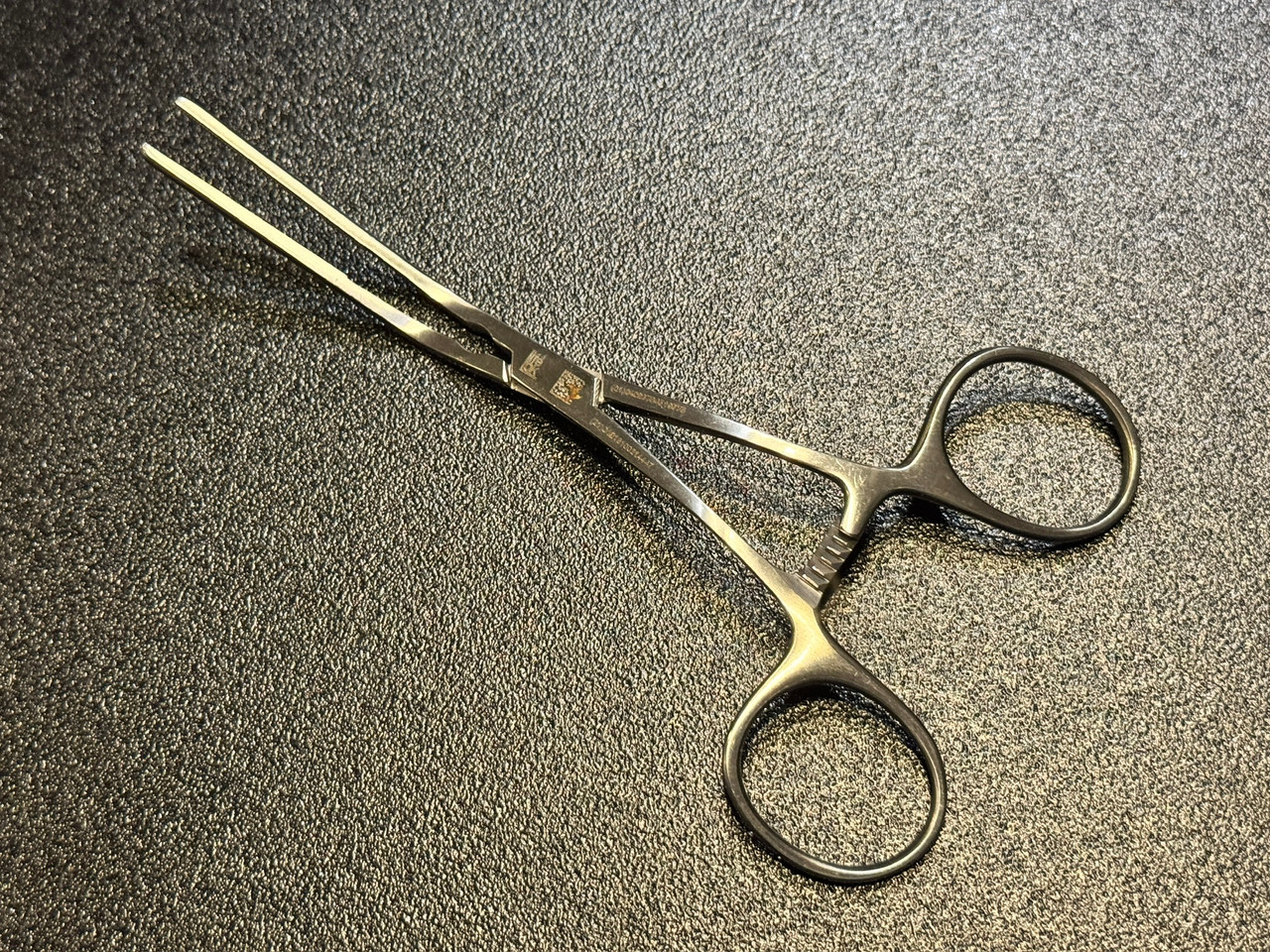 Handle photo of Pilling 353189 DeBakey Ring Handle Bulldog Clamp, ANG 45°, 5 ⅜"