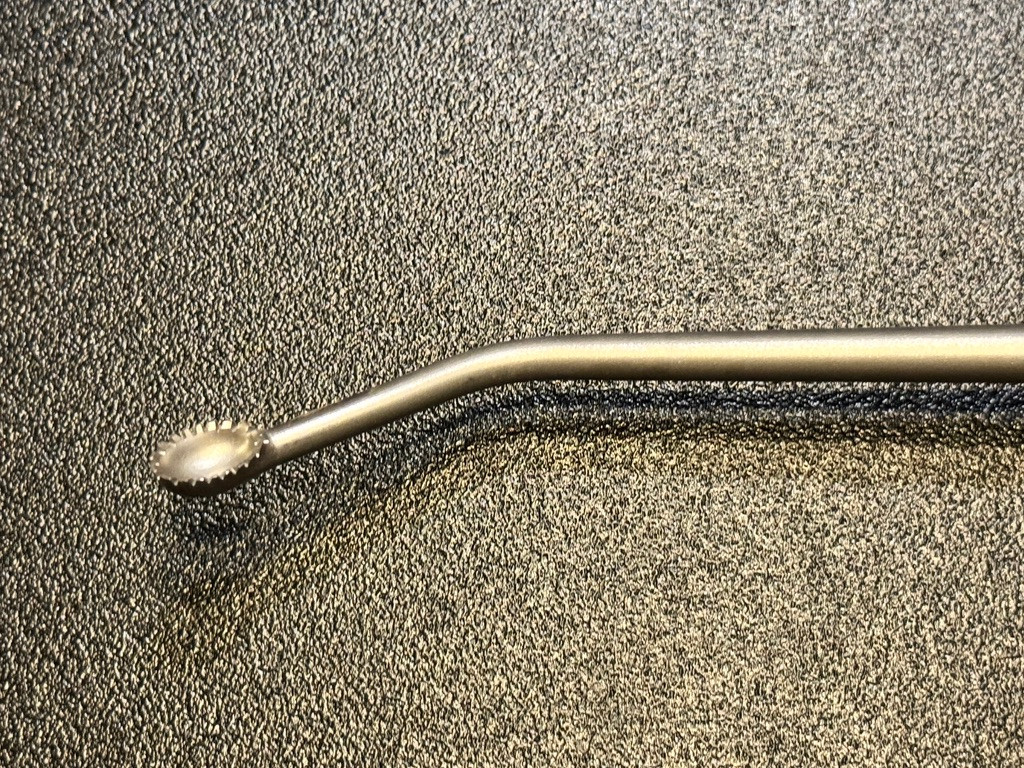 Cup photo of Titan Spine 1900-0006 Toothed Left Angled Spinal Curette, 8mm