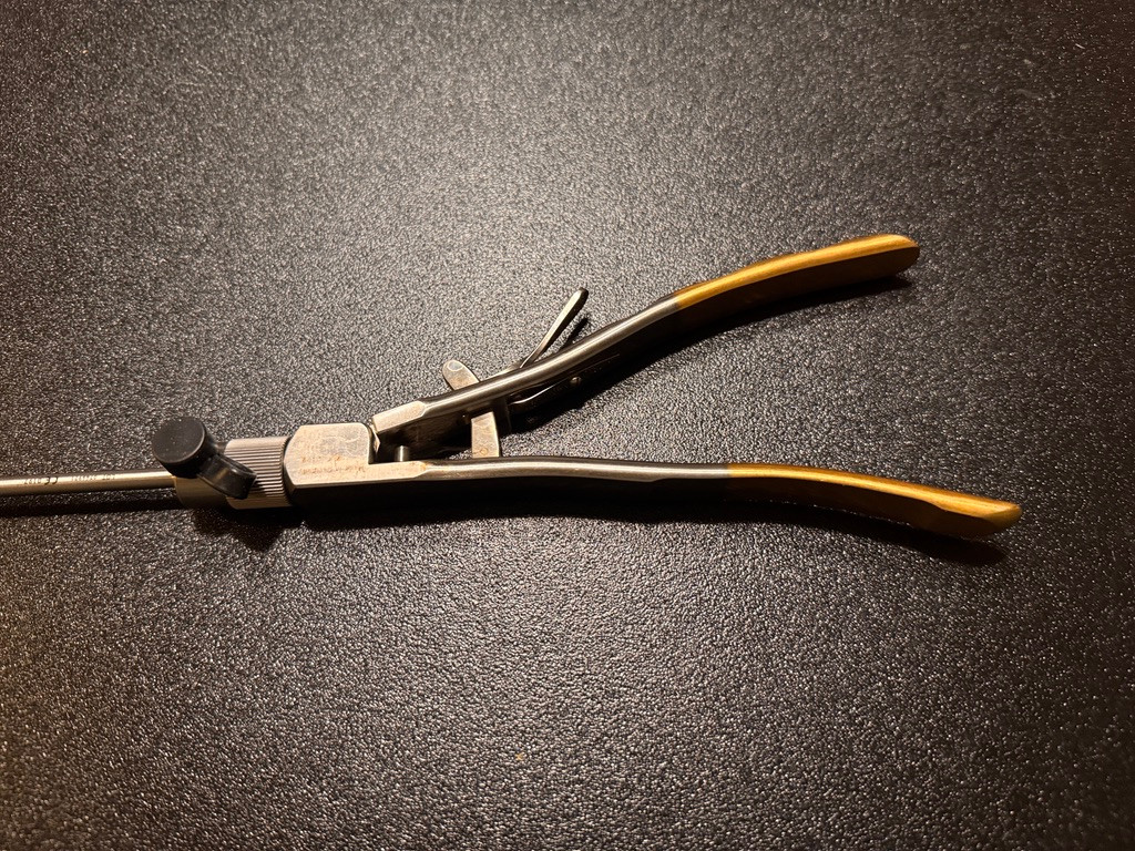 Handle photo of Stryker 250-080-590 Laparoscopic Needle Holder, CVD Right, TC, 5mm X 45cm