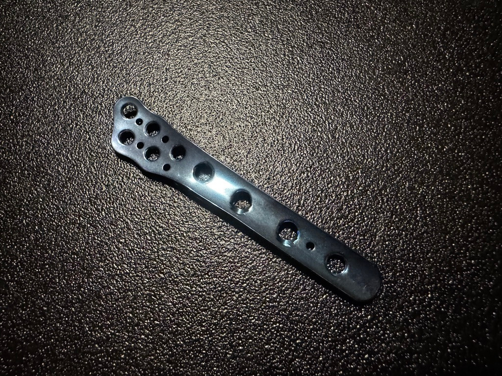 Back photo of Acumed 7007-0104L Lateral Fibula Plate, 4-Hole, Left