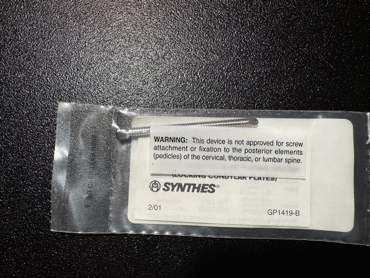 Screw photo of Synthes 02.204.058 4mm Locking, Self Tapping Screw, 58mm