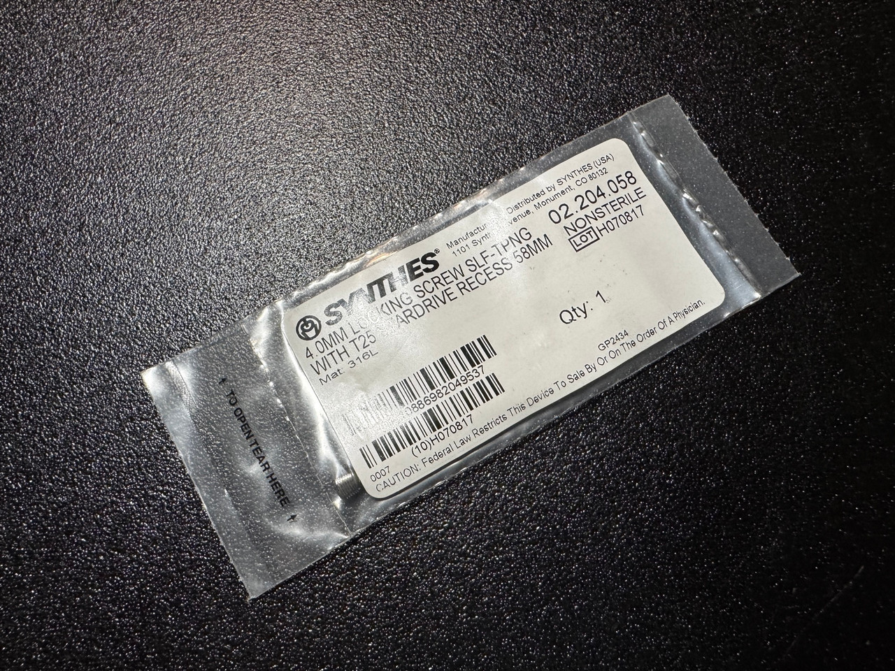 Photo of Synthes 02.204.058 4mm Locking, Self Tapping Screw, 58mm