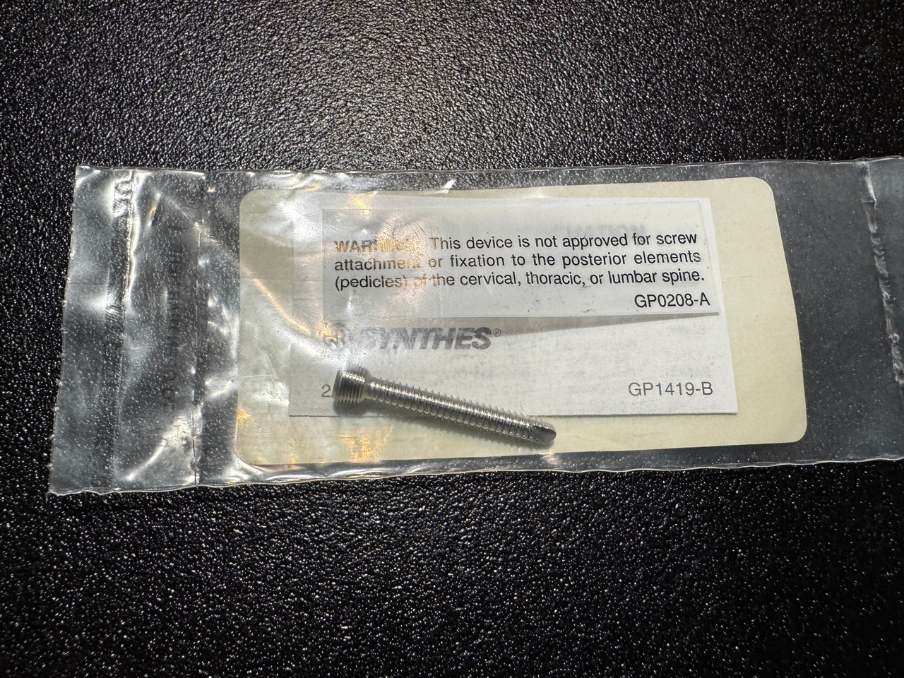 Screw photo of Synthes 02.204.034 4mm Locking, Self Tapping Screw, 34mm