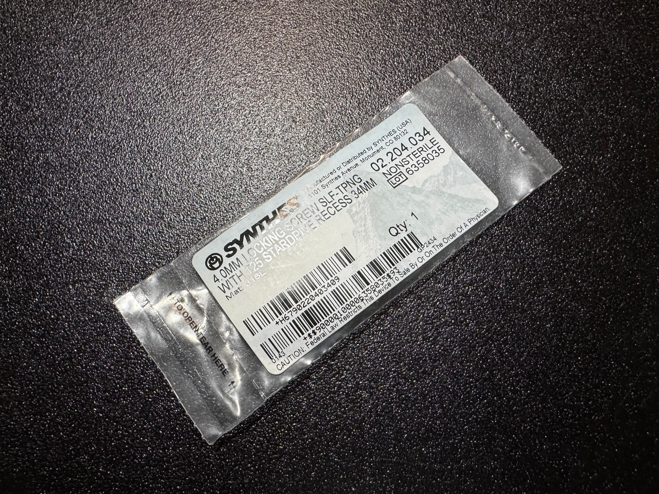 Photo of Synthes 02.204.034 4mm Locking, Self Tapping Screw, 34mm