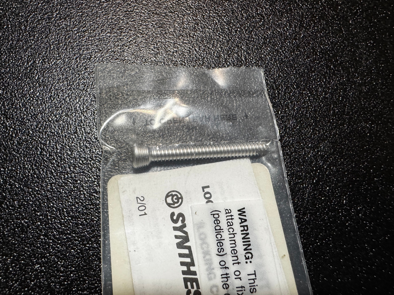 Screw photo of Synthes 02.204.038 4mm Locking, Self Tapping Screw, 38mm