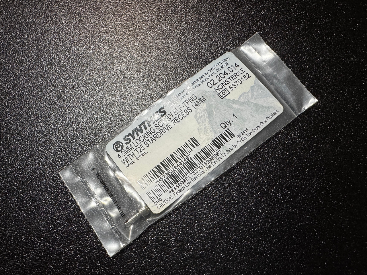 Photo of Synthes 02.204.014 4mm Locking, Self Tapping Screw, 14mm