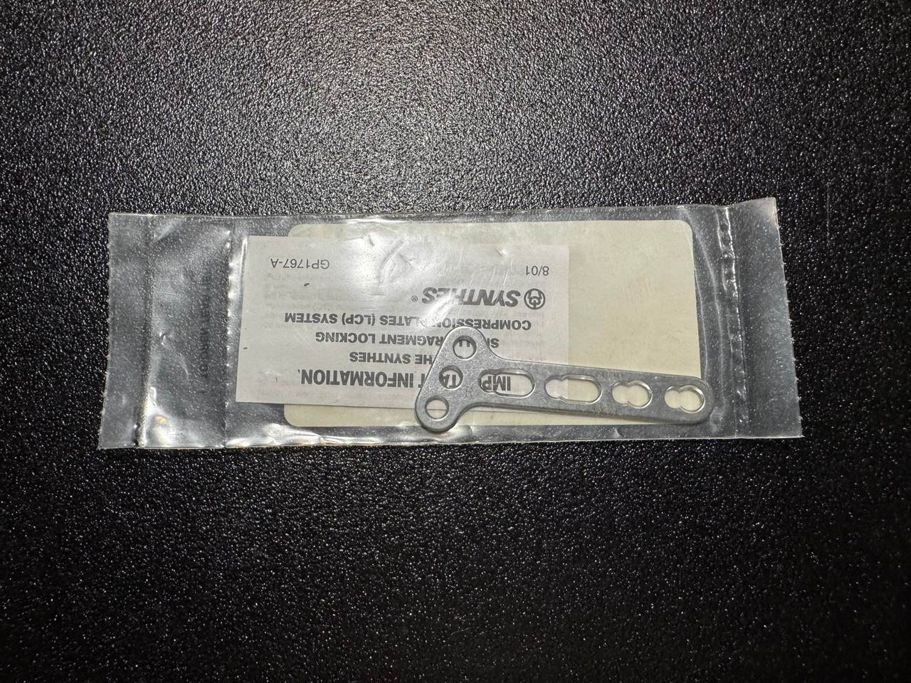 Plate photo of Synthes 241.041 3.5mm LCP T-Plate 3H Head, 4H Shaft, Oblique Right, 63mm