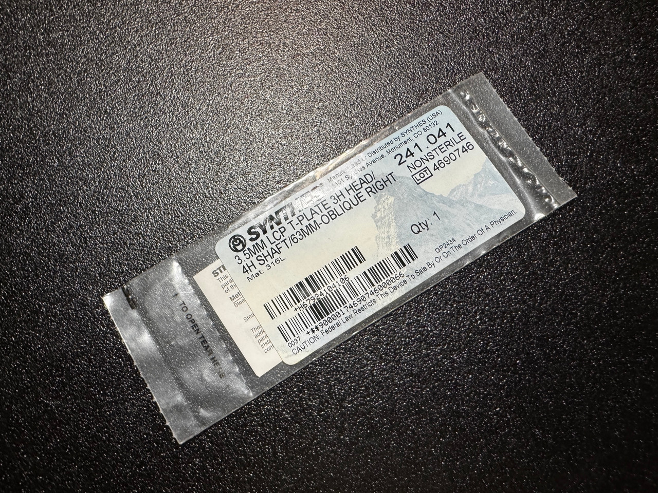 Photo of Synthes 241.041 3.5mm LCP T-Plate 3H Head, 4H Shaft, Oblique Right, 63mm