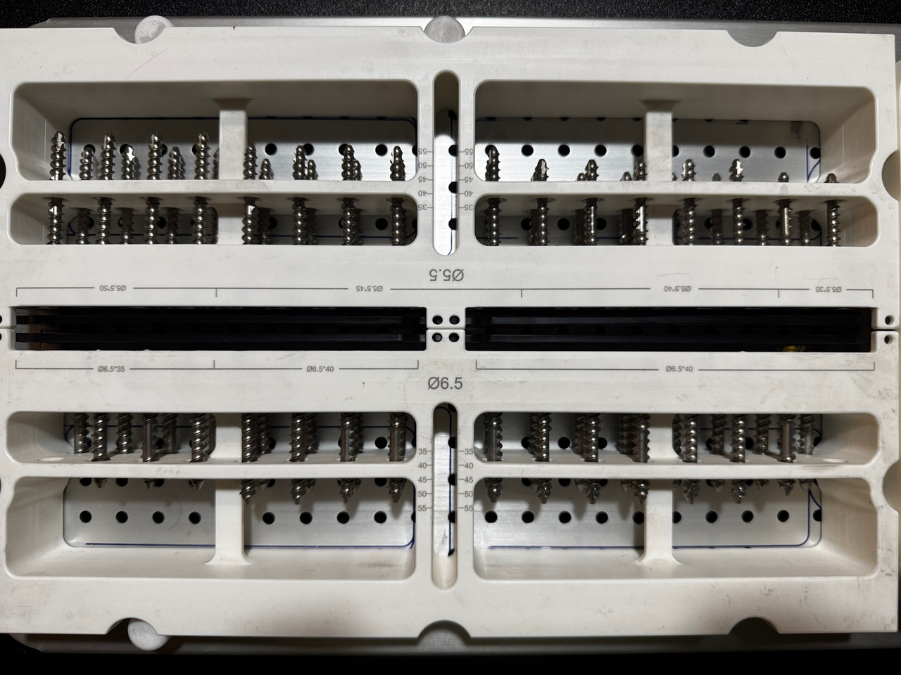 Side photo of Integrated Spine Concepts Aversion Spinal Fixation Implant & Instrument Set