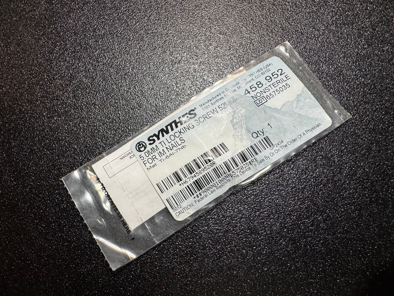 Photo of Synthes 458.952 5.0mm Titanium Locking Screw 52mm