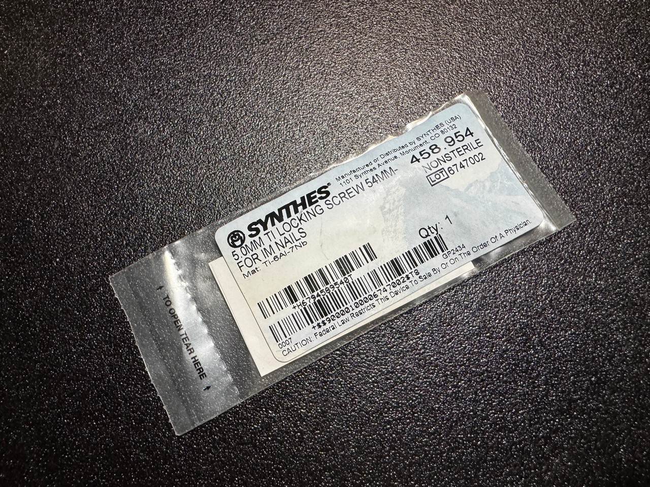 Photo of Synthes 458.954 5.0mm Titanium Locking Screw 54mm