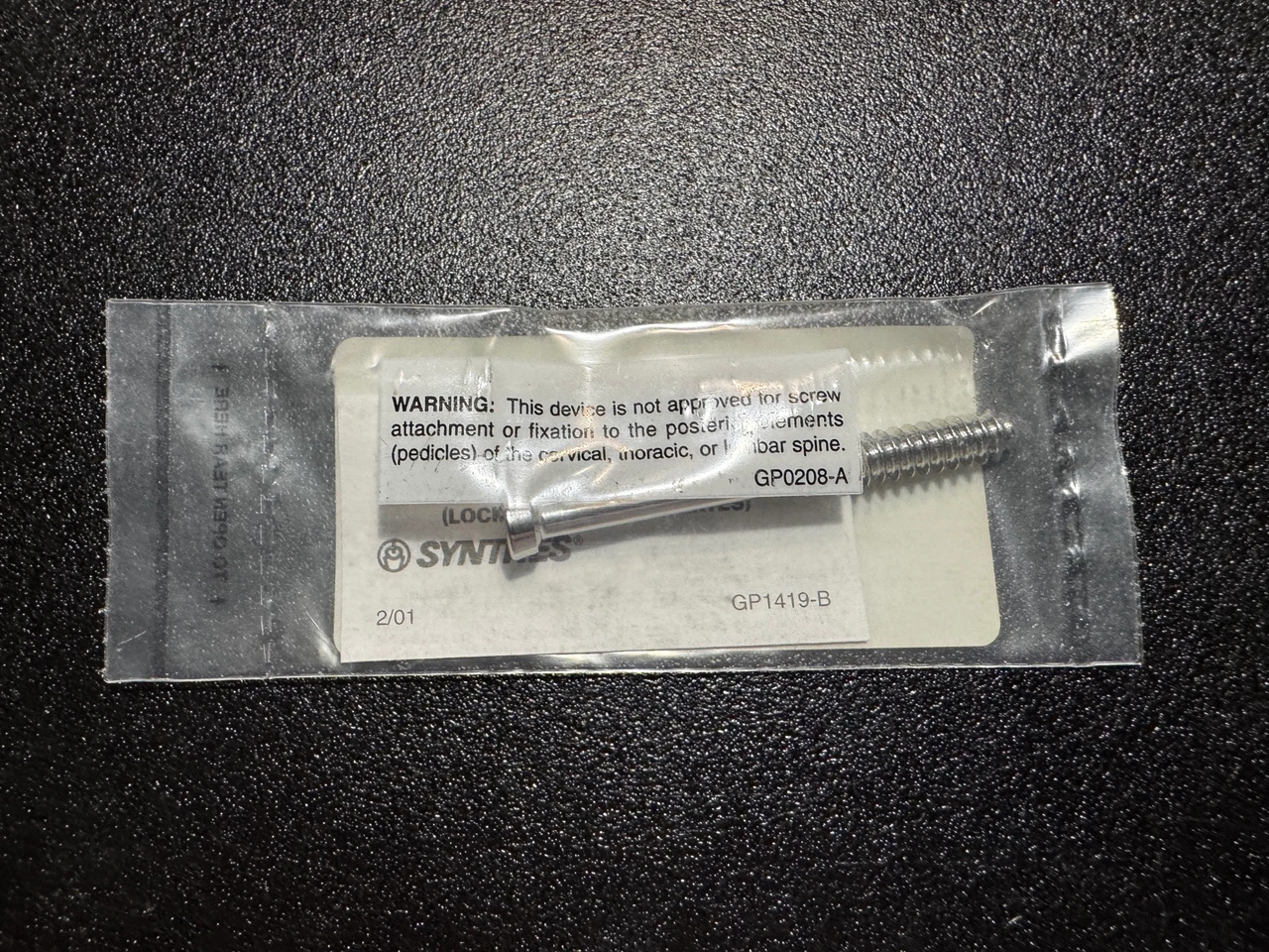 Screw photo of Synthes 02.207.470 7.3mm Cannulated Conical Screw Partially Threaded 70mm