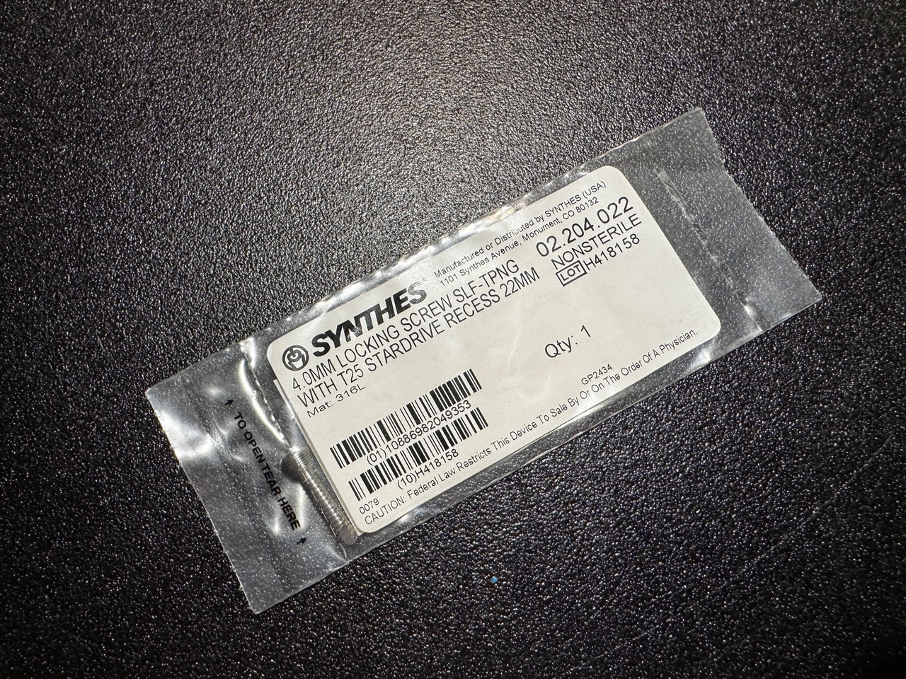 Photo of Synthes 02.204.022 4mm Locking, Self Tapping Screw, 22mm