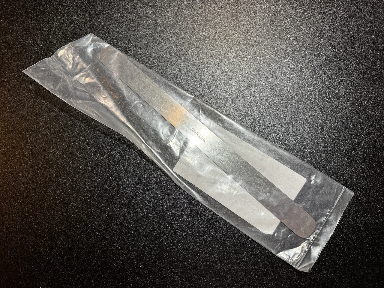 Back photo of V. Mueller SU3340 FLEXSTEEL Ribbon Retractor, 13" X 1" (New)