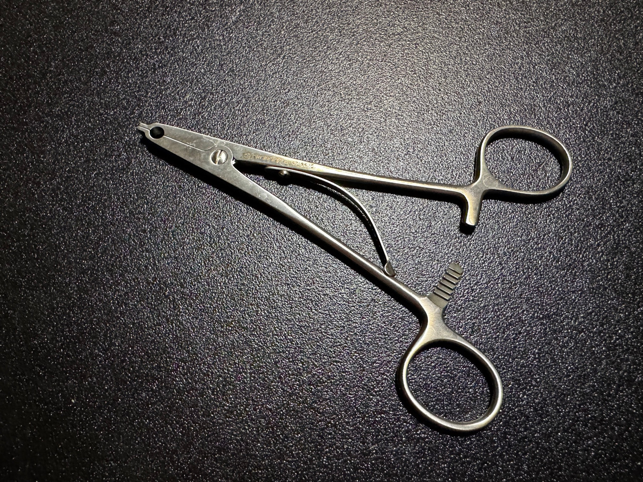 Handle photo of Symmetry 57-8505 Raney Scalp Clip Applying Forceps