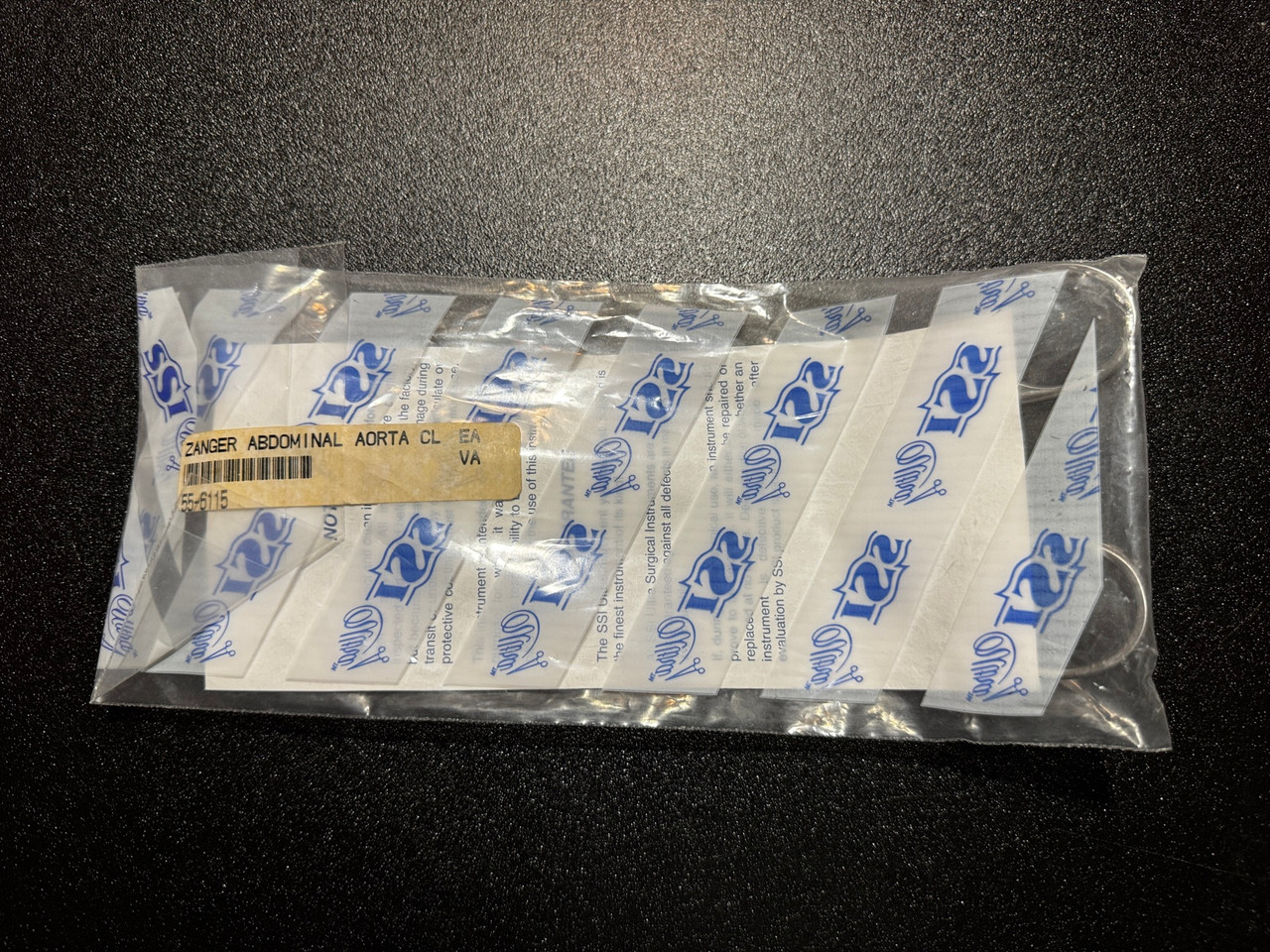 Package photo of Symmetry 55-6115 Zanger Abdominal Aorta Clamp, CVD, 9.5" (New)
