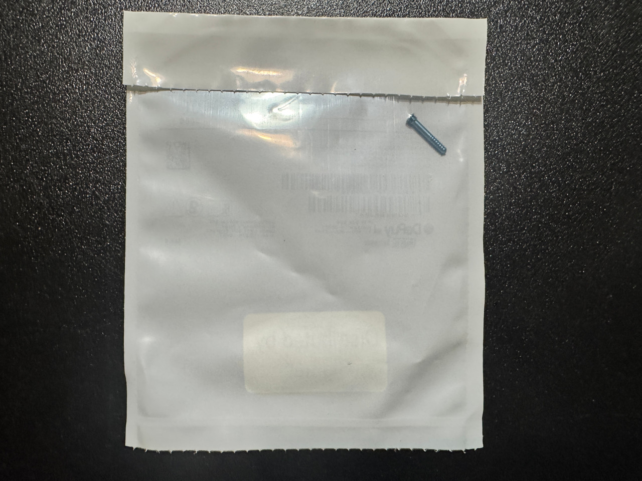 Screw photo of Depuy TP18000 Peg Partial Thread, 2.5mm X 18mm