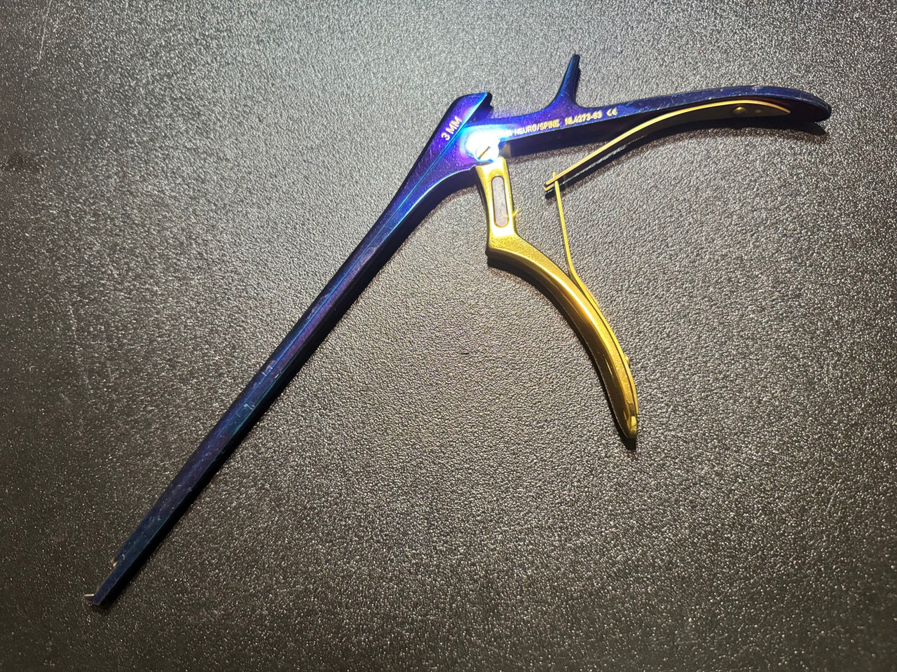 Photo of V. Mueller NL4273-83 Chroma-Line Blue Kerrison Rongeur, 40°, 3mm, 8"