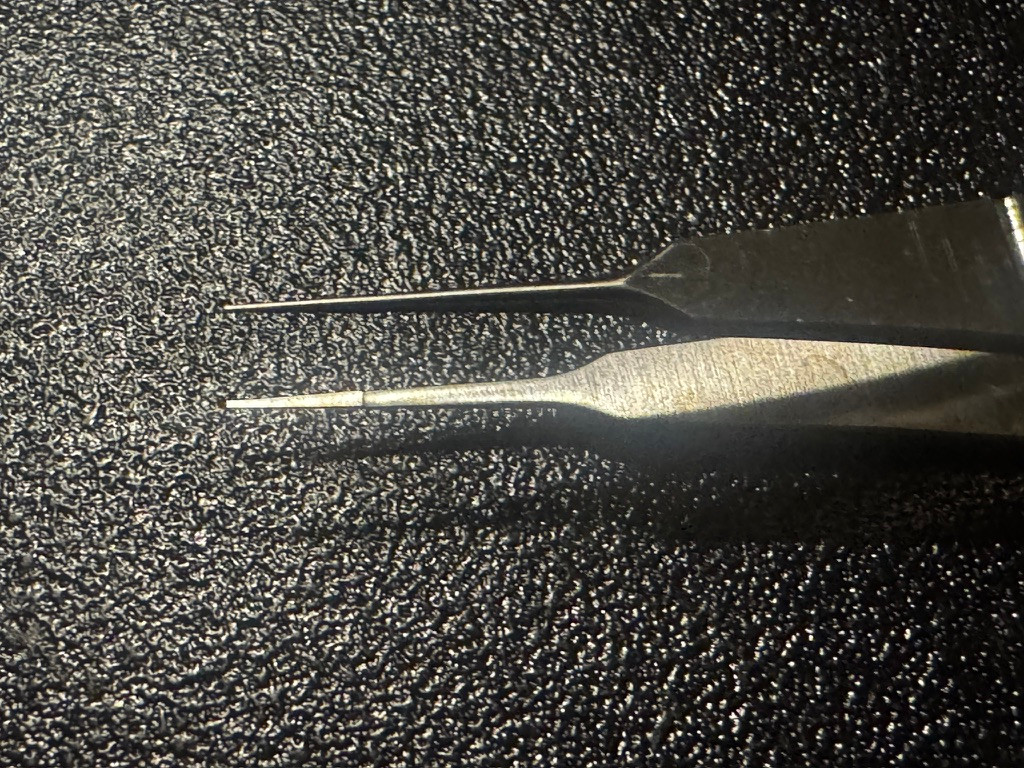 Jaw photo of Jarit 355-159 Castroviejo Suture Tying Forceps, 0.12mm Teeth