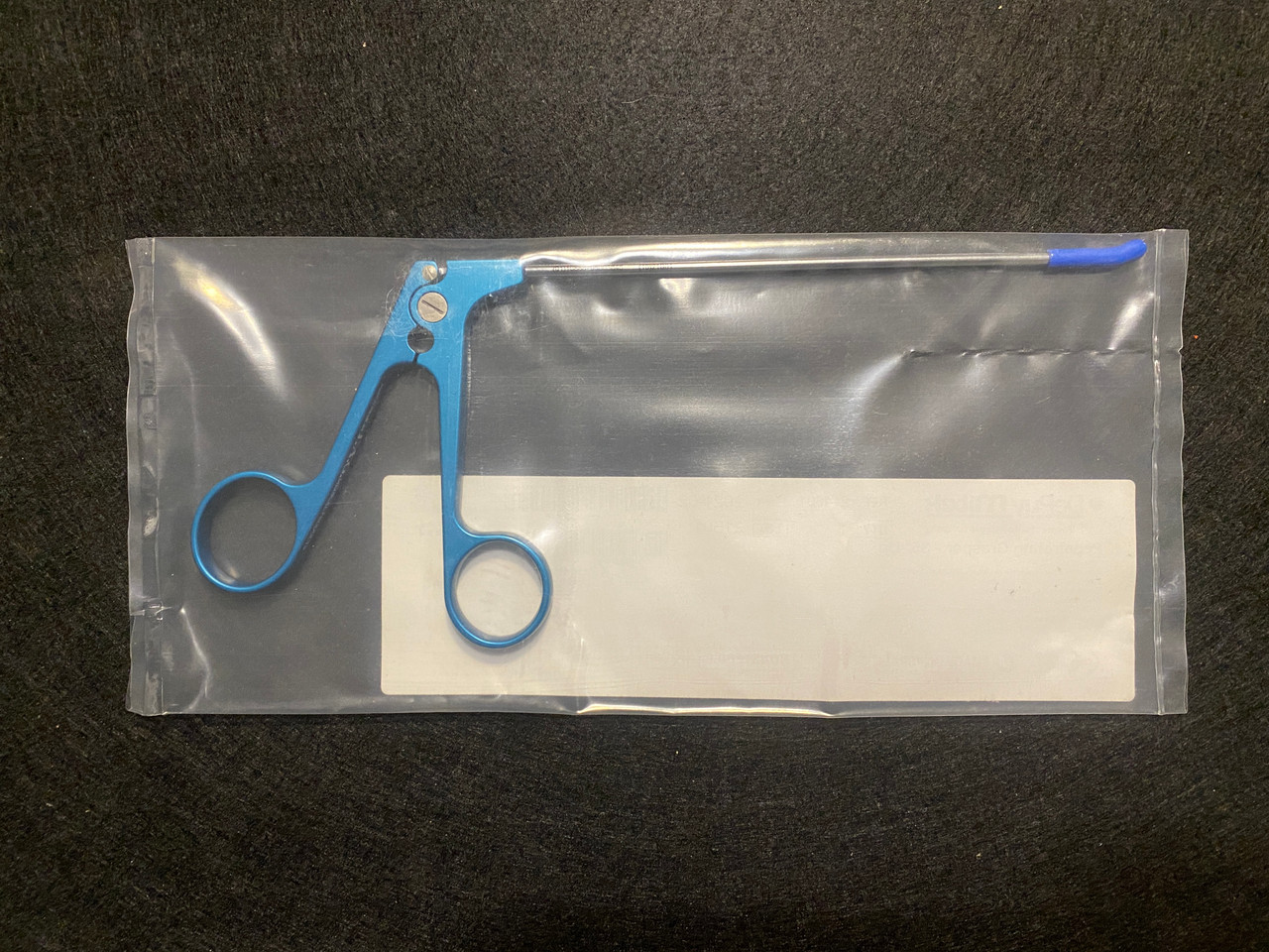 Handle photo of Mitek 214601 TAG Penetrating Suture Grasper 35° Up (New)