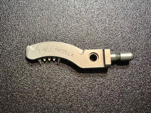 Bottom photo of Stryker Triathlon 6541-3-702 Small Patella Clamp Jaw, Right