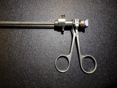Handle photo of ACMI E8213 Rigid Optical Tearing Cup Forceps